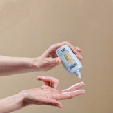 فلوئید ضدآفتاب بدون رنگ ایزدین SPF50 مدل Fusion Water Magic مناسب انواع پوست، حجم 50 میلیلیتر