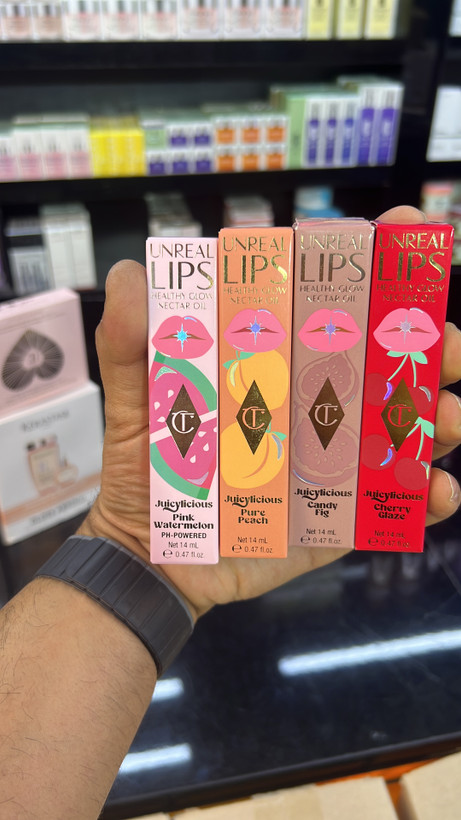 روغن لب شارلوت تیلبری مدل Unreal Lips Healthy Glow Nectar Oil